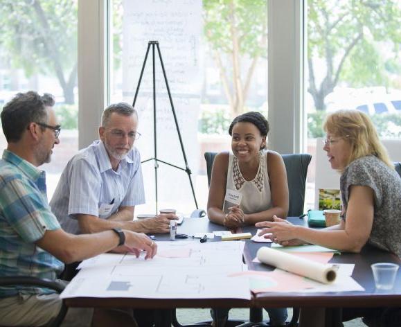 staff meeting in Library